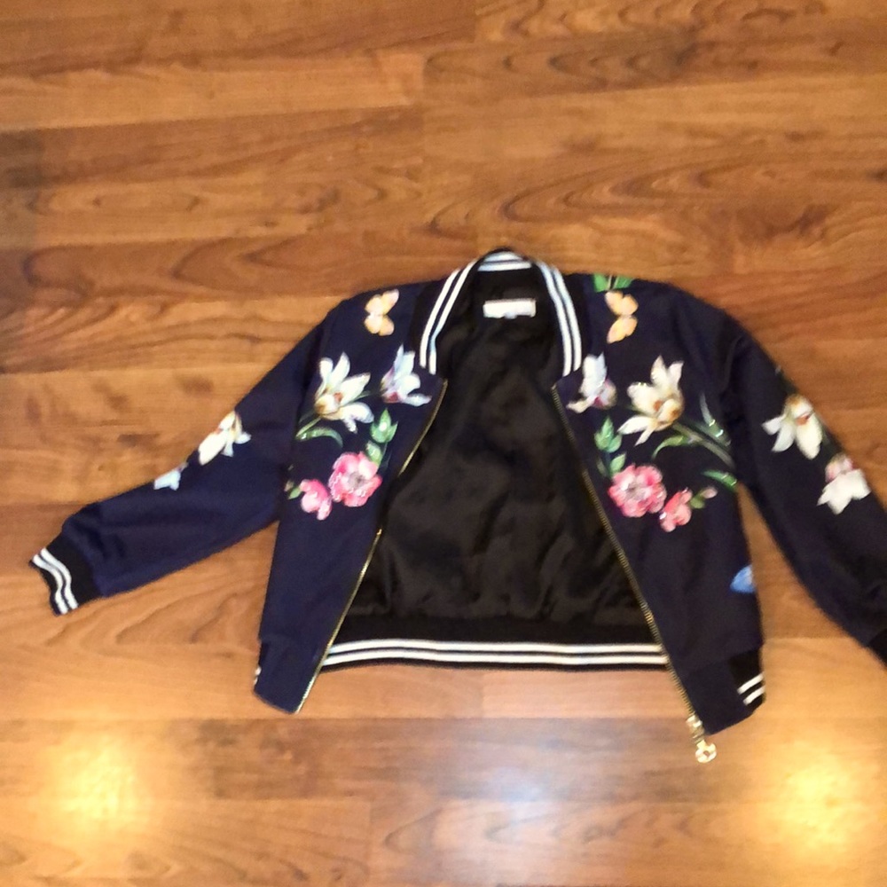 Child girls size 5 bomber jacket with rhinestones.